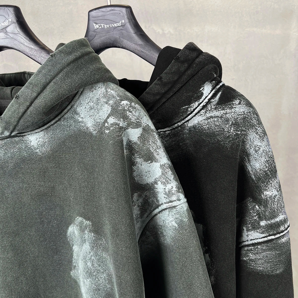 Distressed graffiti baggy hoodie, worn front view
