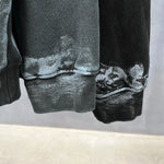 Distressed graffiti baggy hoodie, worn side view