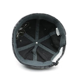 Distressed star brimless hat worn, angled view