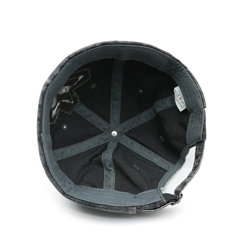Distressed star brimless hat worn, angled view