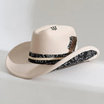 Elegant Beige Distressed wide-brim cowboy hat worn tilted on model