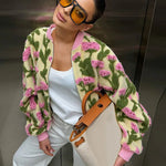 Oversized floral bomber jacket worn — side angle