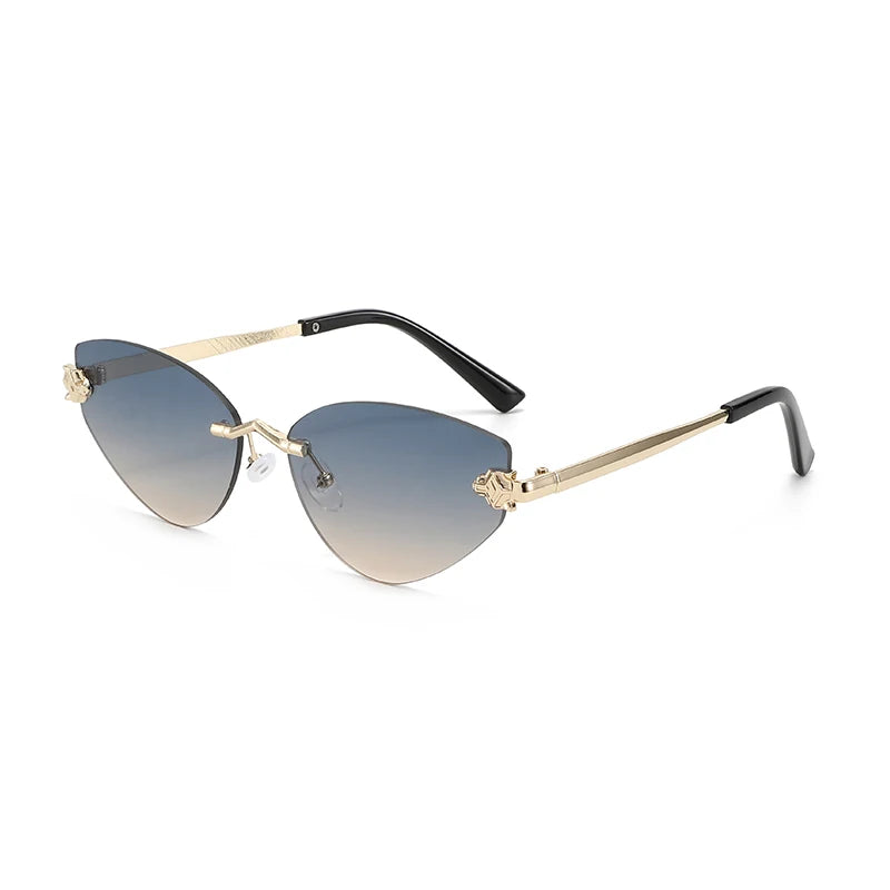 Sunglasses with gold frame and gradient blue lenses on a white background