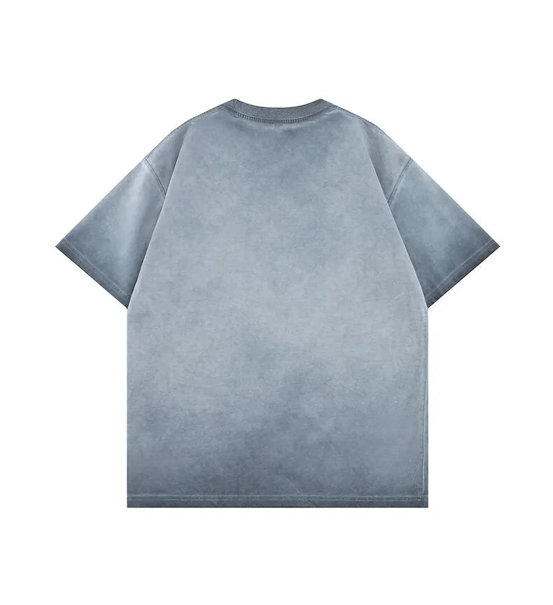 Close-up of gradient wash detail on oversized crew neck tee