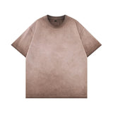 Model wearing gradient washed loose crew neck tee — oversized street style fit