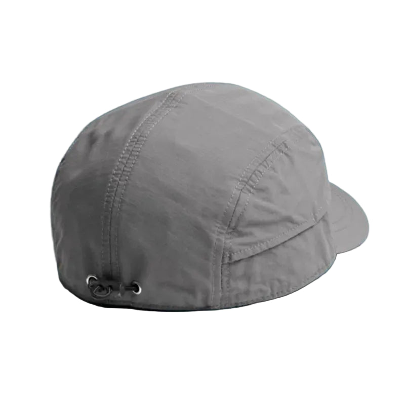 Gray cap on a teal background