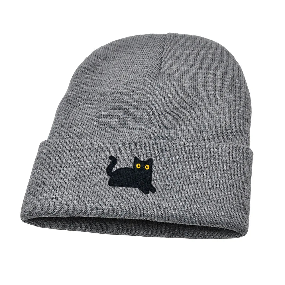 Gray beanie with a black cat embroidered on a white background
