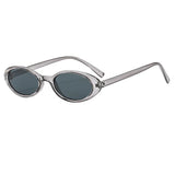 Gray-Black Model wearing small oval cat eye sunglasses, alternate lifestyle shot