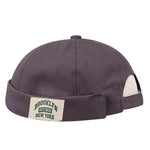 Gray cap with a 'Brooklyn New York' label on a white background