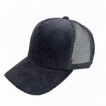 A gray corduroy trucker cap with a curved brim and black mesh back panels, shown from a three-quarters angle on a white background.
