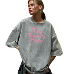 Gray Devil's Mood washed oversized graphic tee — front view with distressed letter print