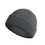Gray knit beanie on a white background