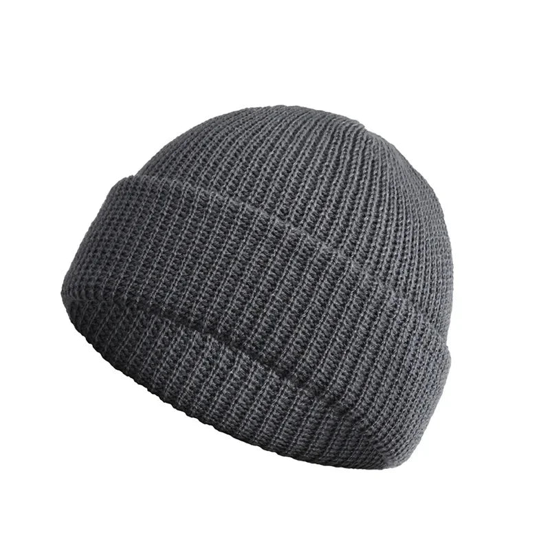 Gray knit beanie on a white background