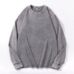 Gray Oversized acid wash long sleeve tee shown flat lay with dropped shoulders and ribbed cuffs
