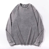 Gray Oversized acid wash long sleeve tee shown flat lay with dropped shoulders and ribbed cuffs