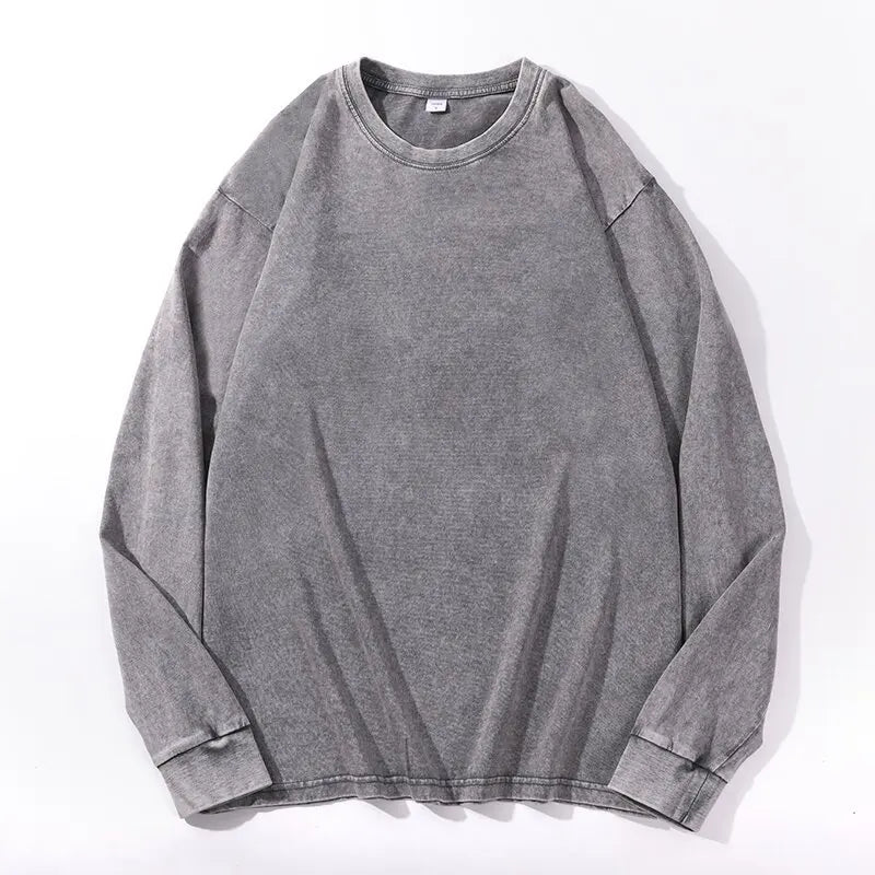 Gray Oversized acid wash long sleeve tee shown flat lay with dropped shoulders and ribbed cuffs