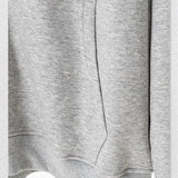 Gray sweatshirt with a pocket on a white background