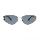 Sunglasses with gold frames and black arms on a white background