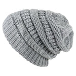 Gray knitted beanie on a white background