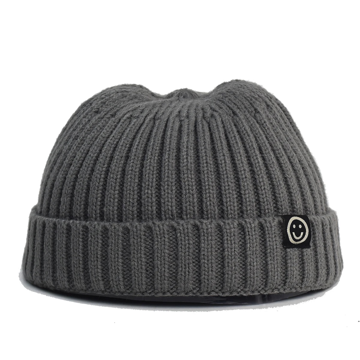 Gray knit beanie with a smiley face logo on a white background