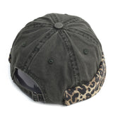 Gray baseball cap with leopard print brim on a white background
