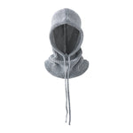 Gray knitted balaclava on a light gray background