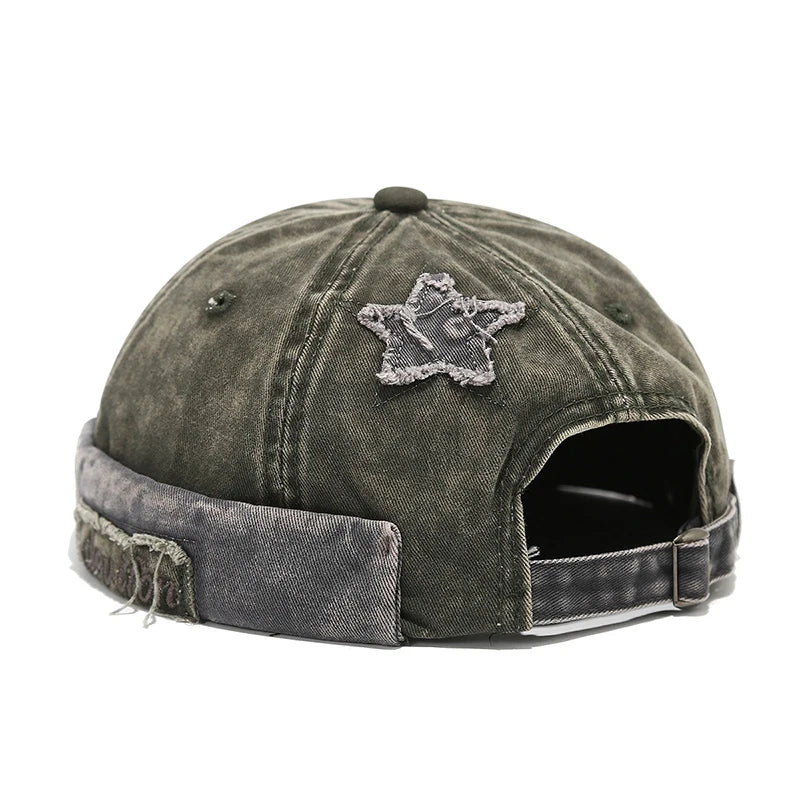 Green Lifestyle shot of model wearing acid wash brimless cap
