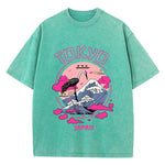 Green Model wearing women's loose fit acid wash graphic streetwear tee, front