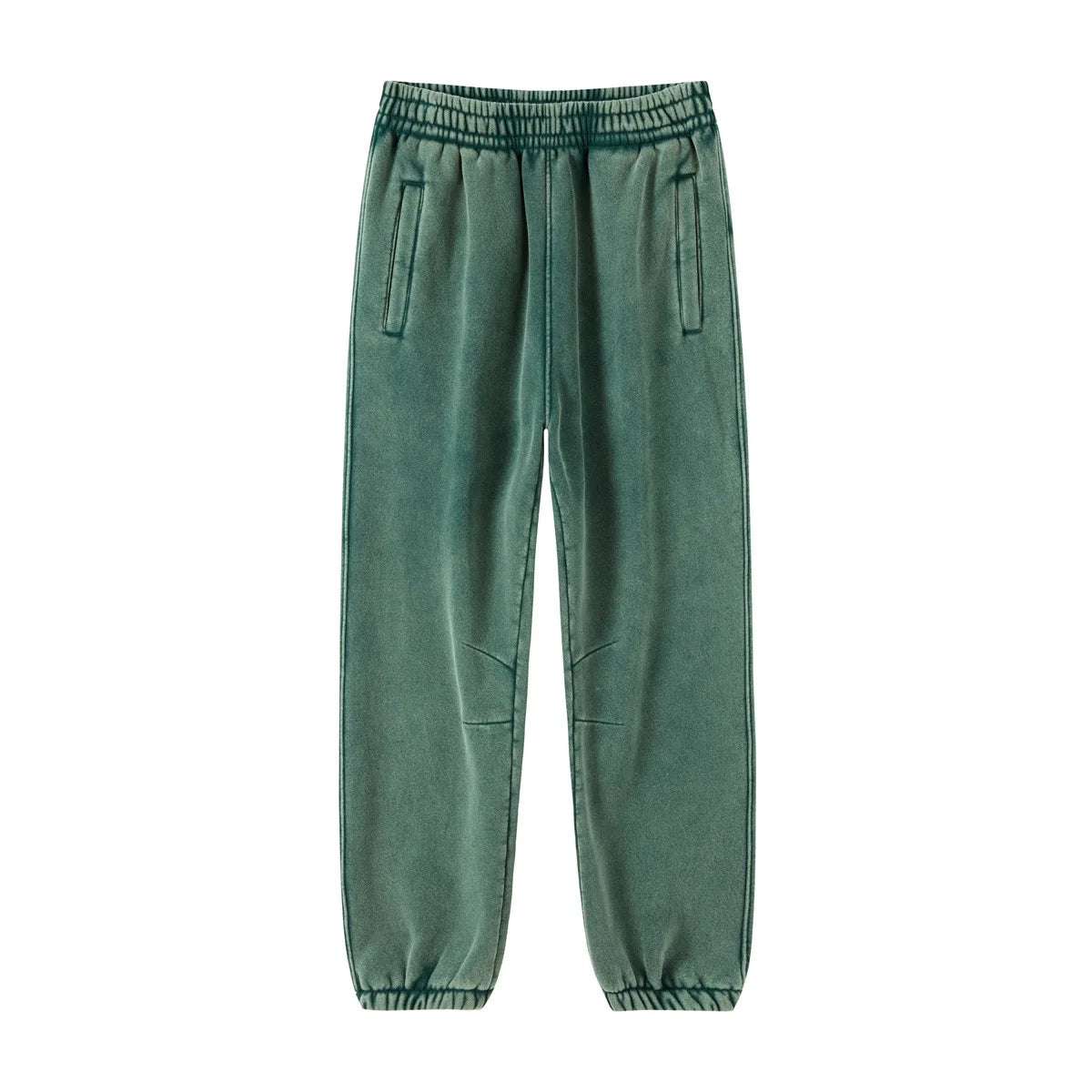 Green Men's baggy washed fleece sweatpants — worn close-up