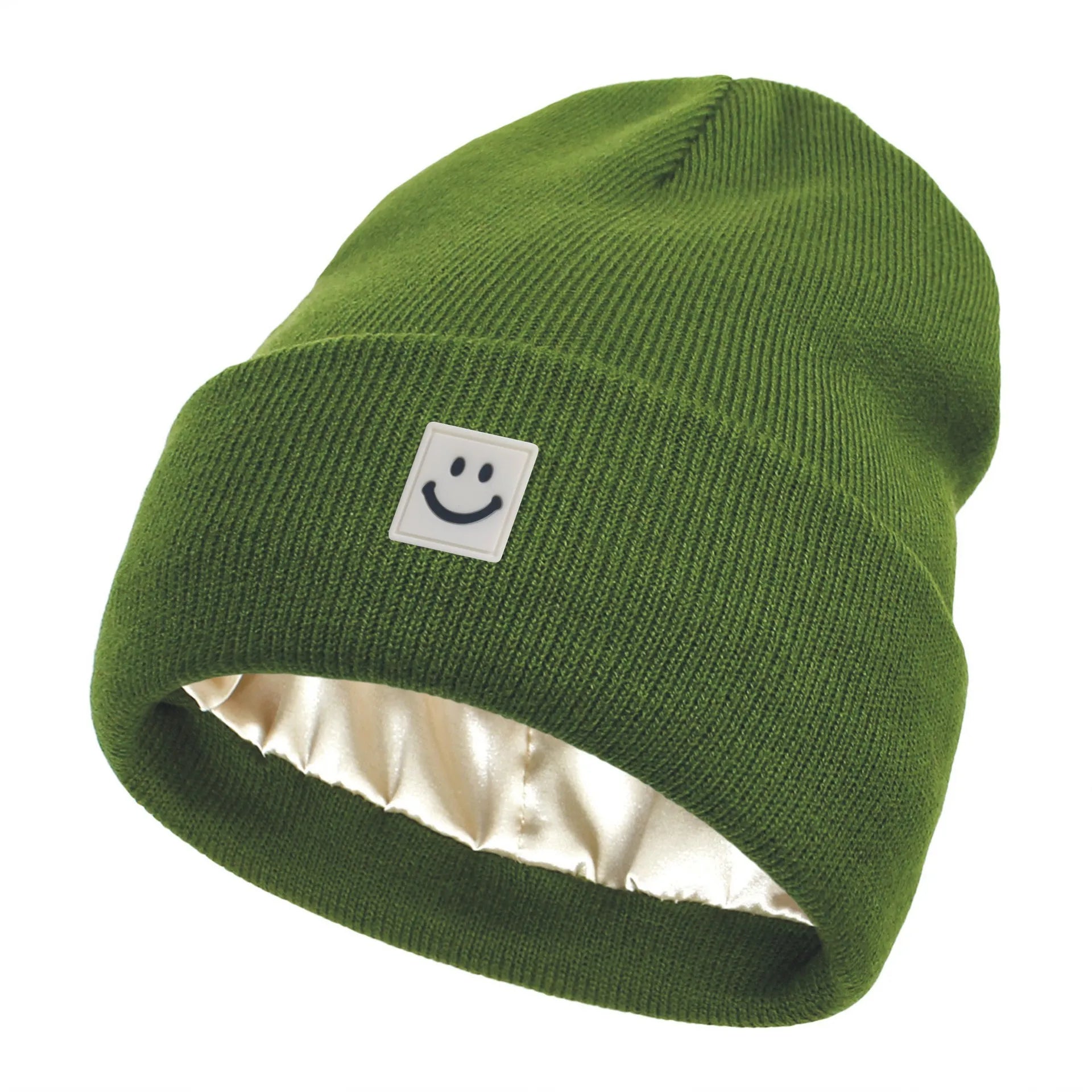 Green beanie with a smiley face logo on a white background