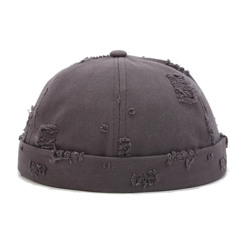 Grey Brimless docker hat lifestyle shot, casual street styling