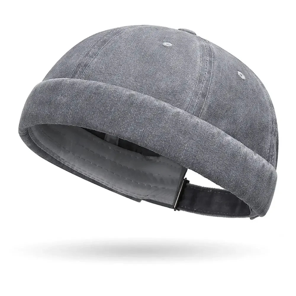 Gray denim cap on a white background
