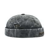 Grey Distressed star brimless hat worn, side view