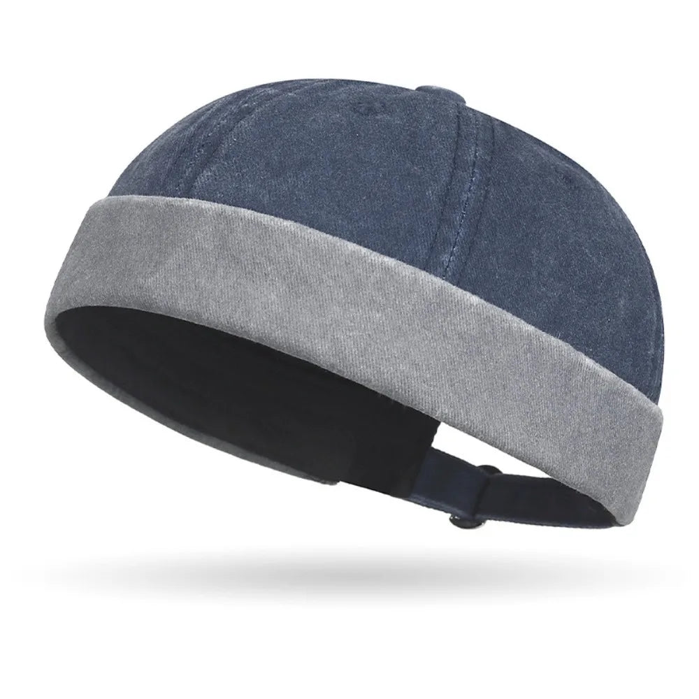 Blue and gray beanie hat on a white background