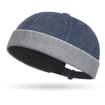 Blue and gray beanie hat on a white background