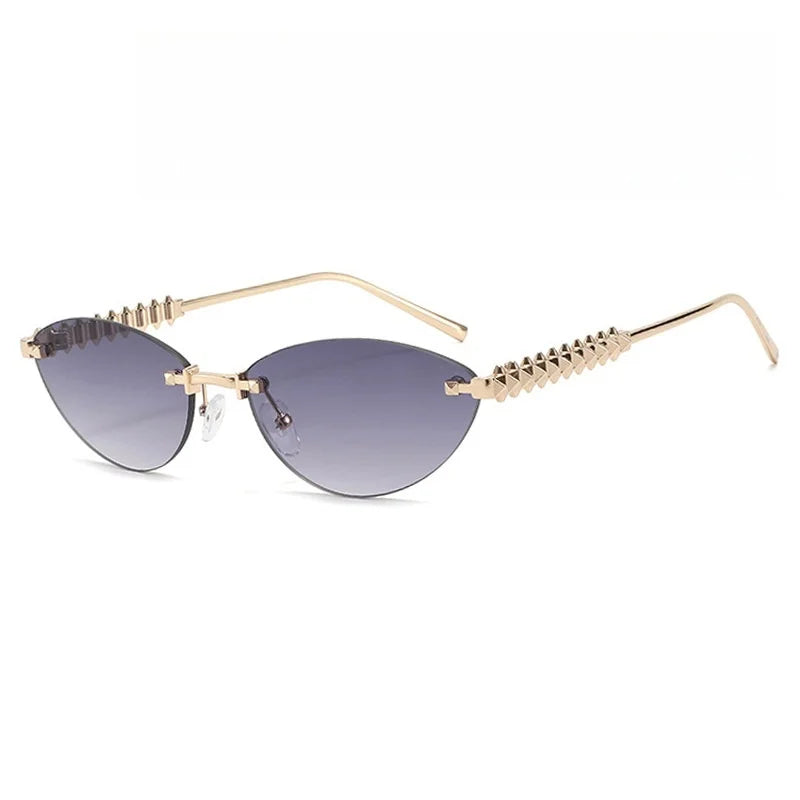 Sunglasses with gold frame and gradient lenses on a white background
