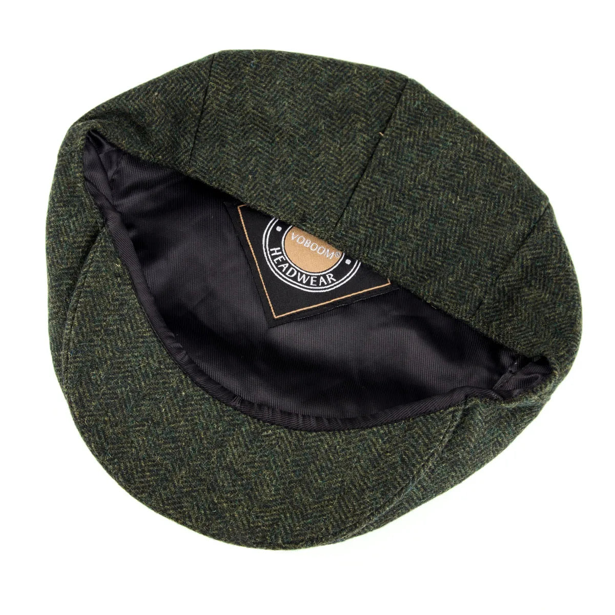 Herringbone tweed flat cap worn, side view
