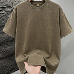 Khaki Mineral washed oversized graphic tee, close-up texture