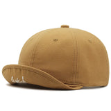 Khaki Short brim baseball cap close-up detail, knit cotton construction
