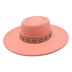 Leather pink wide-brim felt fedora hat, close-up detail of brim and crown