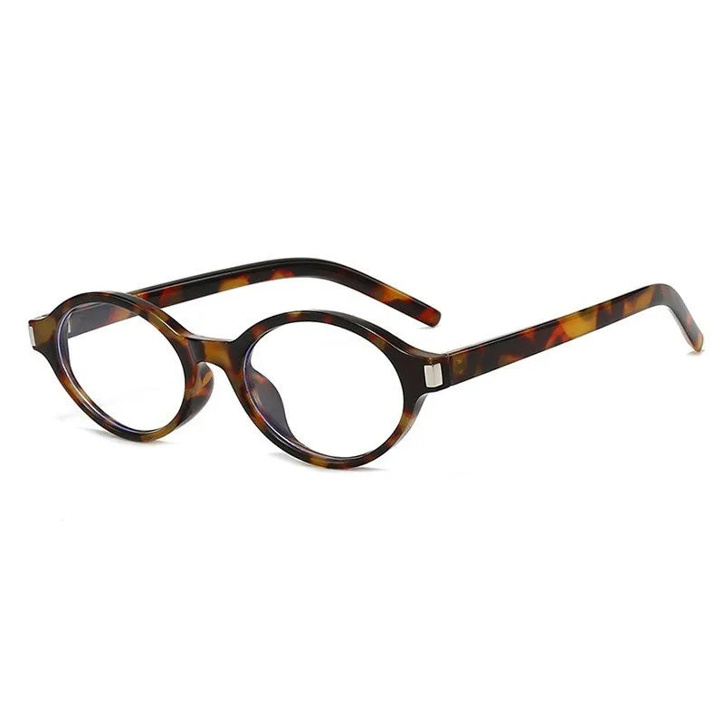 Leopard Clear Model wearing small oval sunglasses in alternate colorway — on-face view
