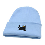 Light blue beanie with a black cat embroidery on a white background