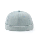 Light blue denim cap on a white background