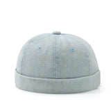 Light blue denim cap on a white background