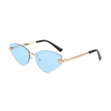 Sunglasses with gold frame and black arms on a white background