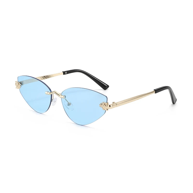 Sunglasses with gold frame and black arms on a white background