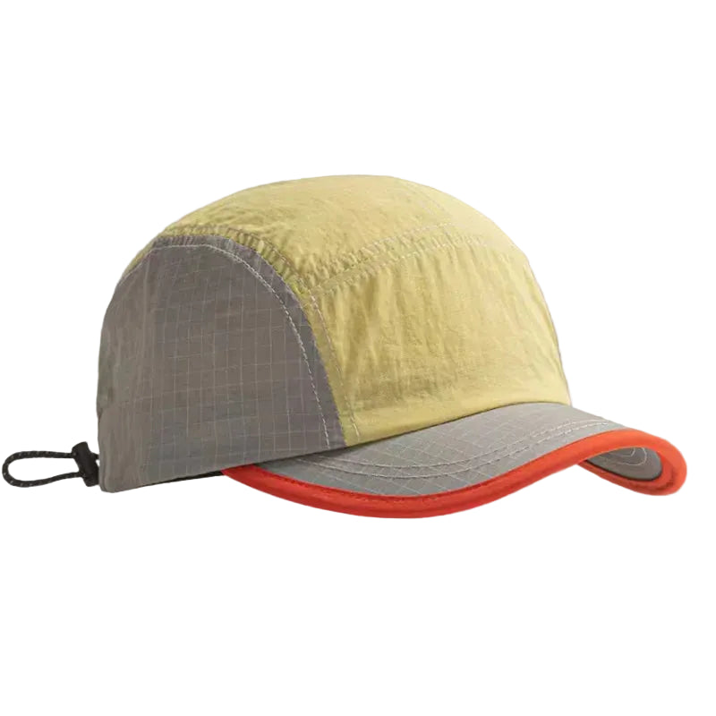 Two-tone cap with yellow top and gray sides on a gray background