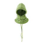 Green knitted balaclava on a white background