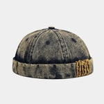 Light Yellow Distressed denim docker cap, top view