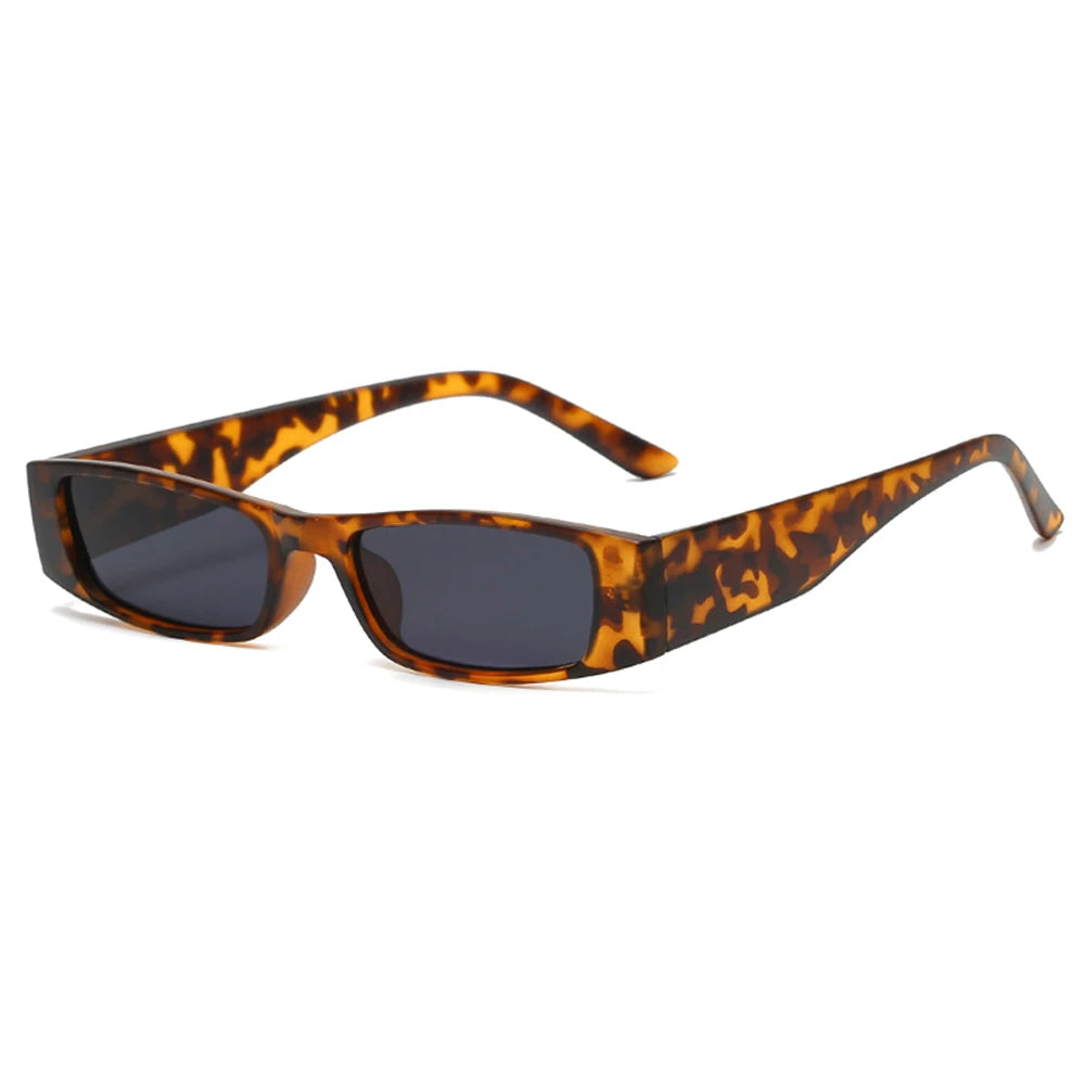Sunglasses with tortoiseshell frame on a white background